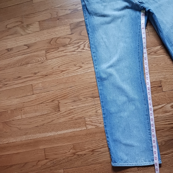 Calvin Klein • Men's Light/Medium Wash Distressed Bootcut Denim Jeans - Picture 12 of 15